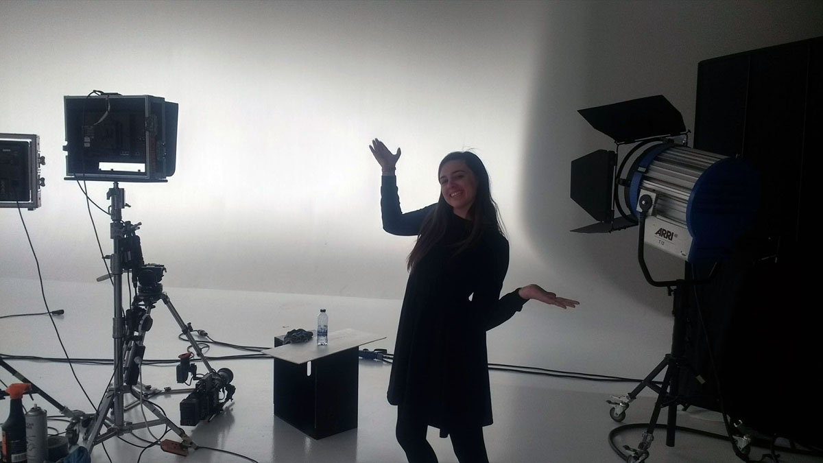 Chloe Wilson in a car studio, girl happy pose